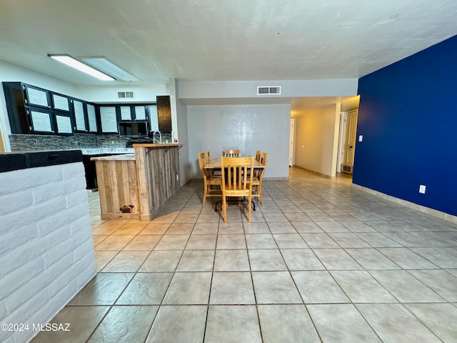 view of tiled dining space