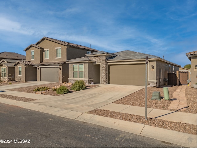 view of front of home with a garage