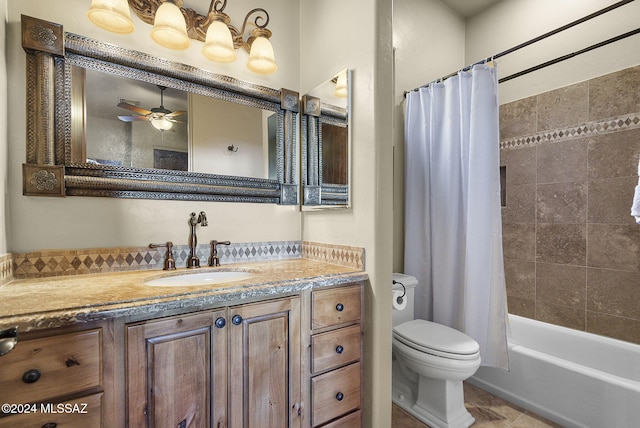 full bathroom with vanity, tile patterned floors, ceiling fan, toilet, and shower / tub combo