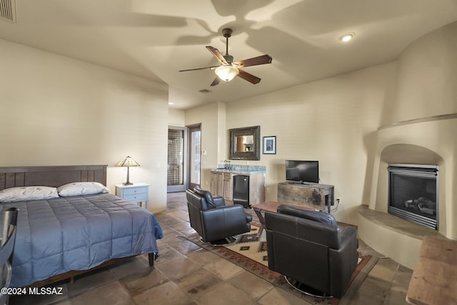 bedroom featuring ceiling fan and lofted ceiling