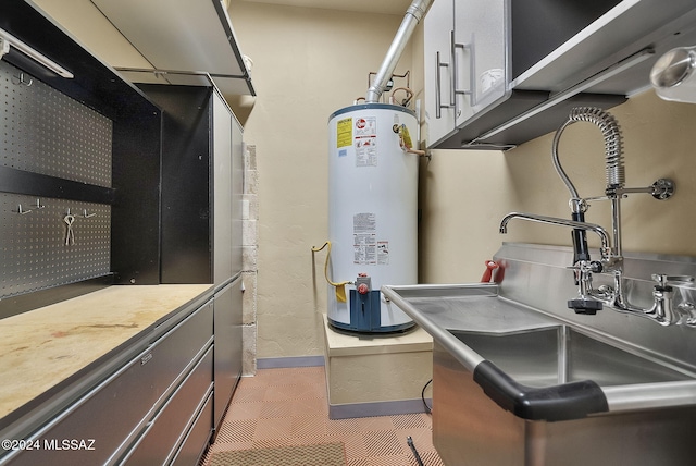 kitchen featuring sink and water heater