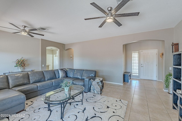 living room with light tile patterned floors