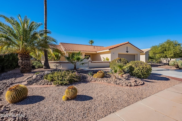 view of front of property featuring a garage