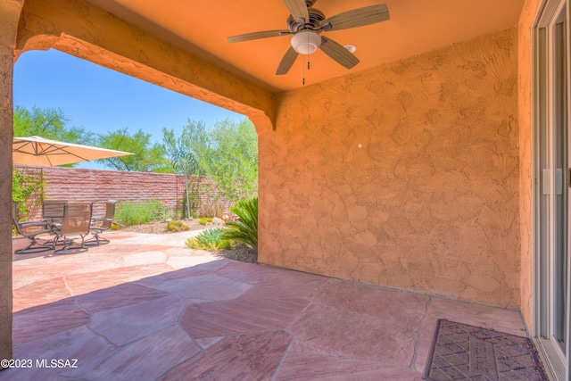 view of patio with ceiling fan