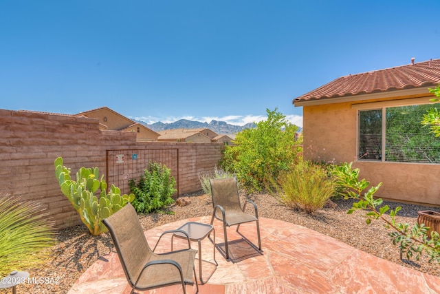 view of patio with a mountain view