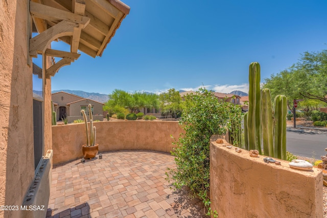 view of patio featuring a mountain view