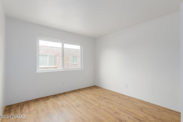 empty room featuring light hardwood / wood-style floors