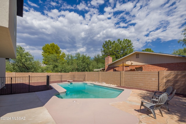 view of pool featuring a patio area