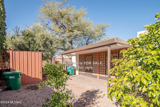 exterior space featuring fence