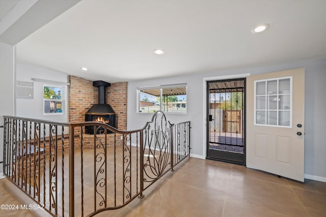 foyer with a wood stove