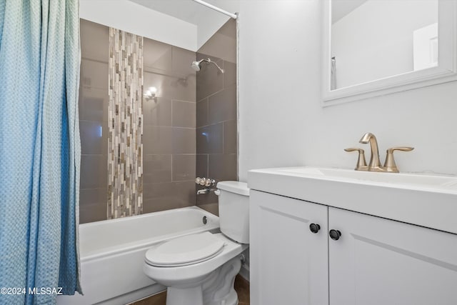 full bathroom featuring vanity, toilet, and shower / tub combo