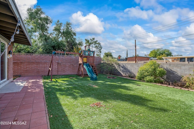 view of yard featuring a playground