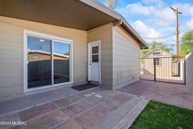 property entrance with a patio