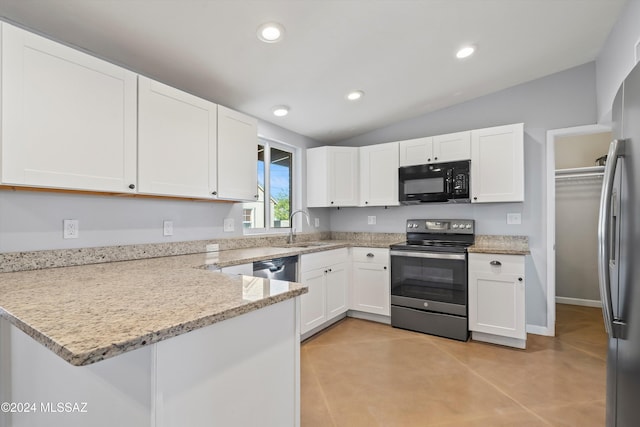 kitchen featuring white cabinets, kitchen peninsula, and appliances with stainless steel finishes