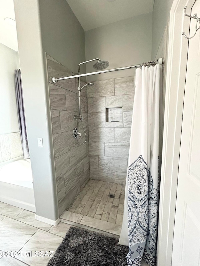 bathroom with curtained shower