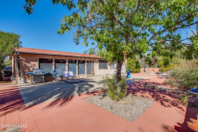 back of house featuring a patio area