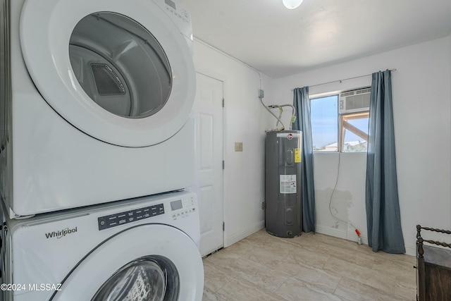 washroom with a wall mounted air conditioner, electric water heater, and stacked washer / drying machine