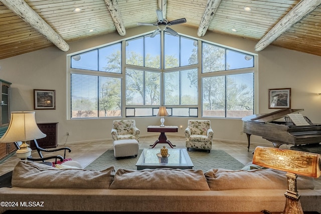 interior space with ceiling fan, light tile patterned floors, high vaulted ceiling, wooden ceiling, and beamed ceiling