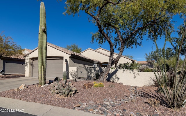 view of side of home featuring a garage