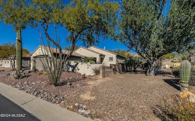 view of side of property with a garage