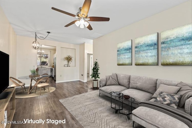 living room featuring ceiling fan, dark wood-type flooring, and sink