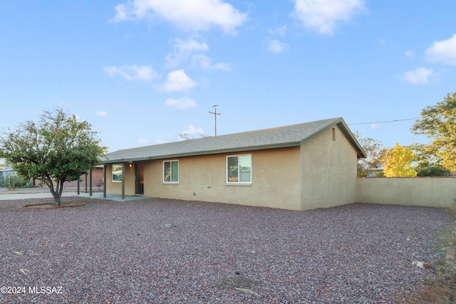 rear view of house with a patio