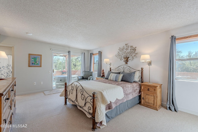 carpeted bedroom with a textured ceiling