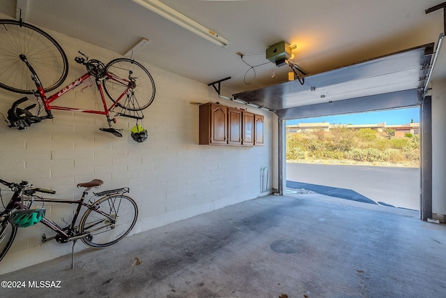 garage featuring a garage door opener