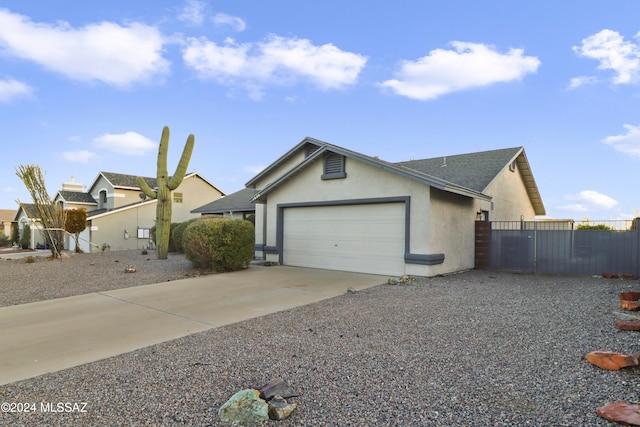 single story home with a garage