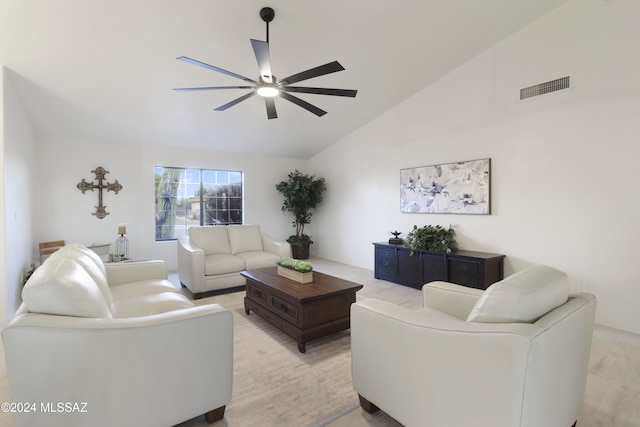 living room with high vaulted ceiling and ceiling fan