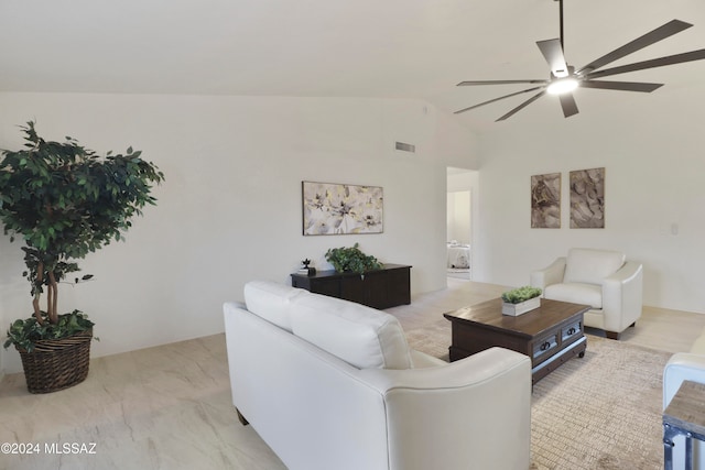 living room with vaulted ceiling and ceiling fan