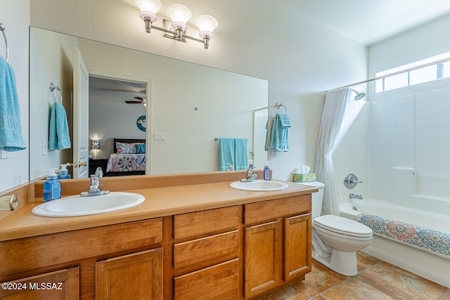 full bathroom with tile patterned floors, vanity, ceiling fan, shower / bathtub combination with curtain, and toilet