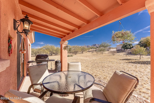 view of patio with a rural view