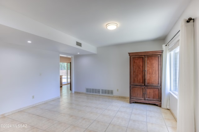 view of tiled spare room