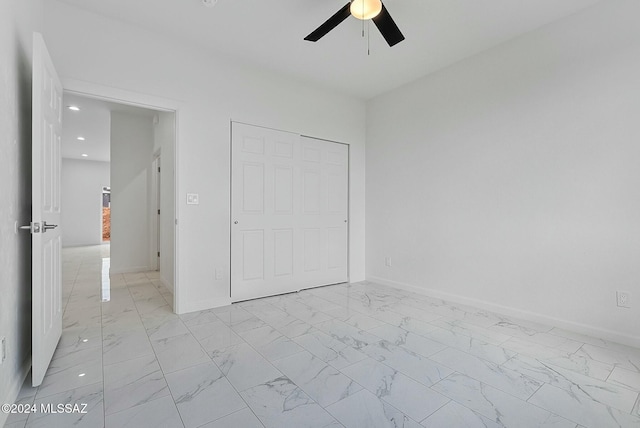 unfurnished bedroom featuring a closet and ceiling fan