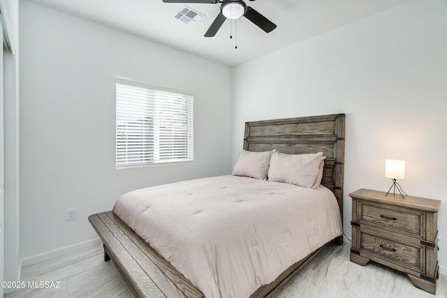 bedroom featuring visible vents, ceiling fan, and baseboards