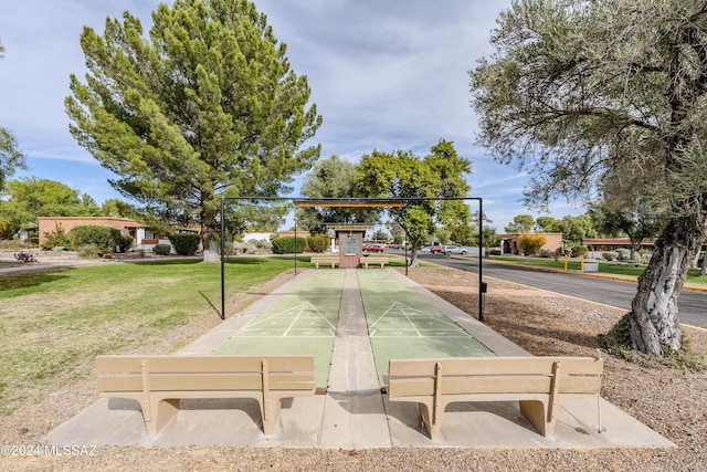 view of community featuring a lawn