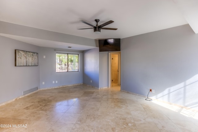 spare room featuring ceiling fan