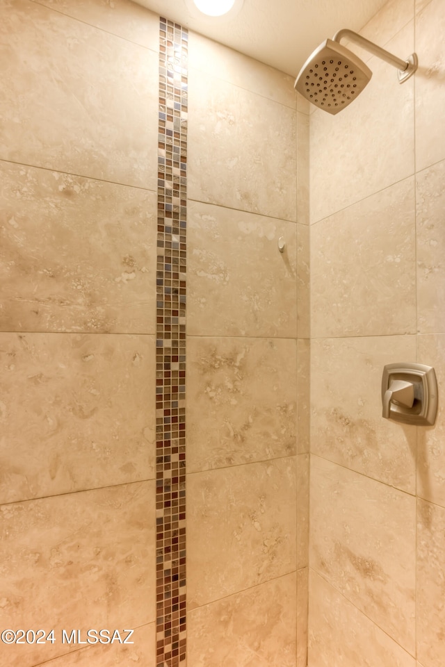 details featuring a tile shower