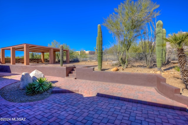 surrounding community with a patio area