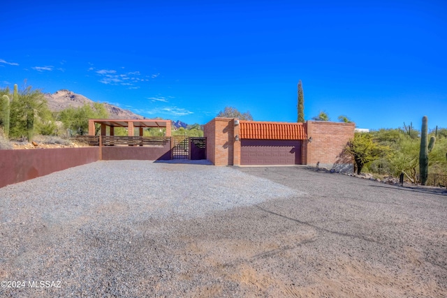 view of front of house with a mountain view