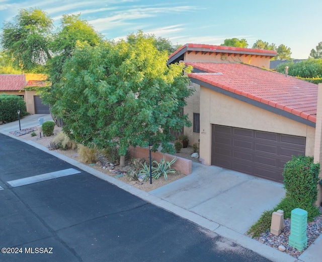 view of front of property with a garage