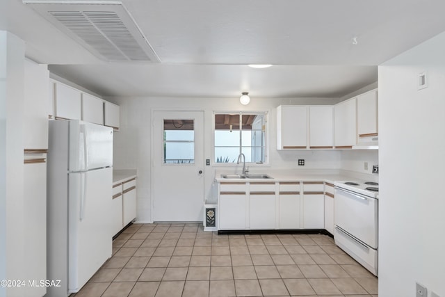 kitchen with sink, white cabinets, ventilation hood, white appliances, and light tile patterned floors