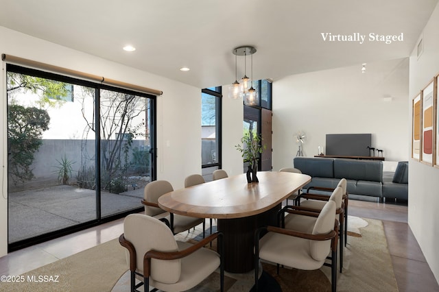 dining room with recessed lighting and visible vents