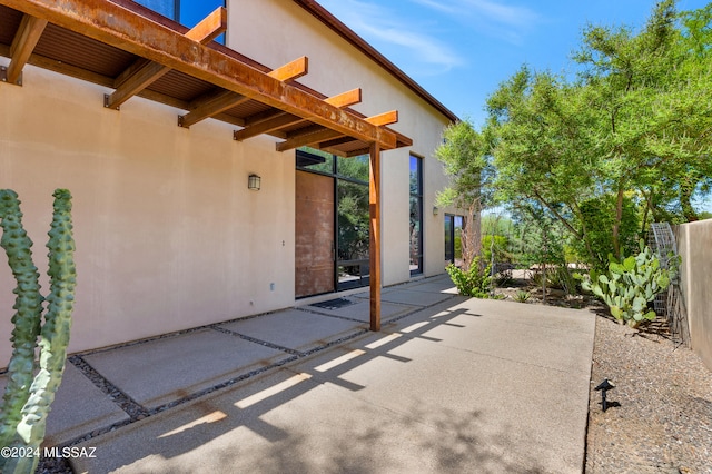 view of patio / terrace with fence