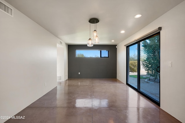 empty room with concrete flooring, recessed lighting, visible vents, and plenty of natural light