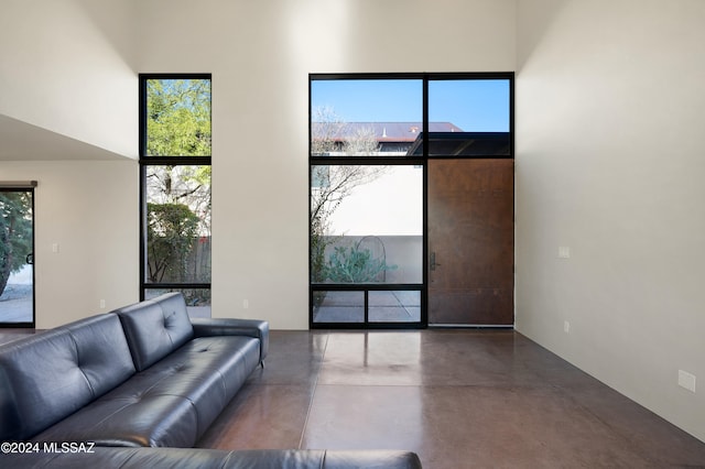 living room with concrete flooring