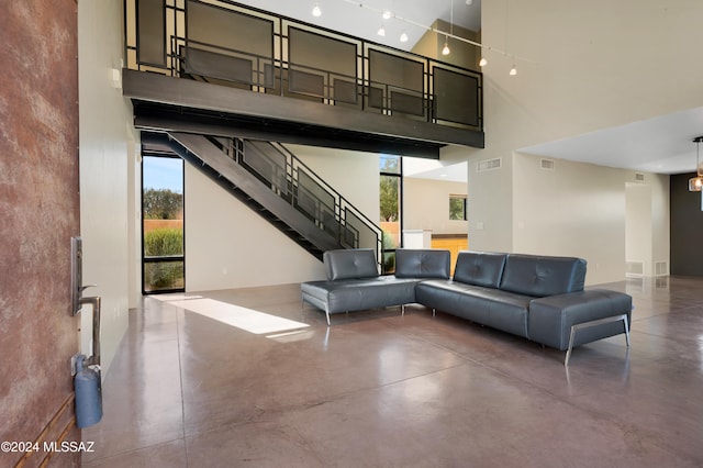 common area with stairs and visible vents