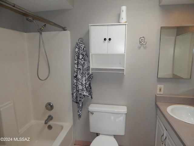 full bathroom with toilet, vanity, and bathing tub / shower combination