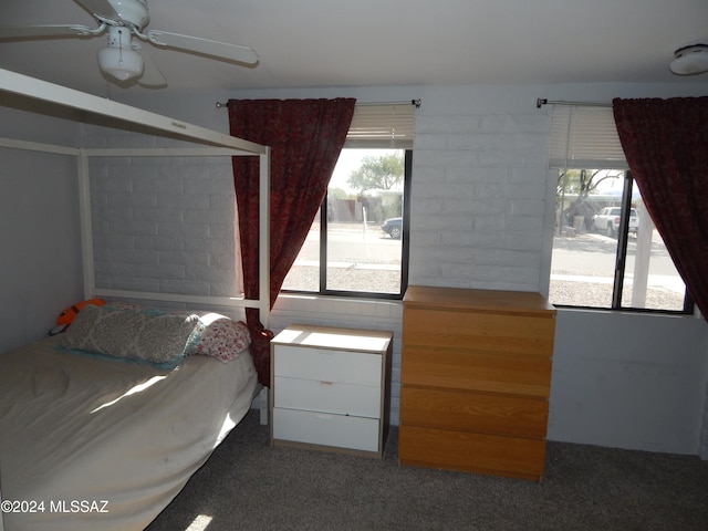 unfurnished bedroom with carpet and ceiling fan